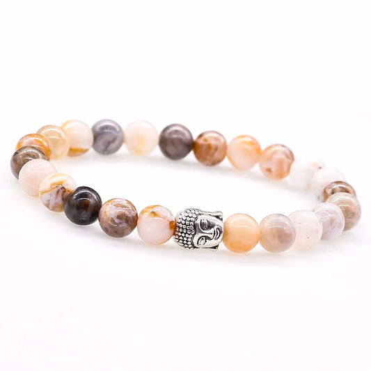 Détail fermoir à bascule bracelet bouddhiste agate, cordon tressé beige