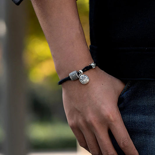 Bracelet Tibétain Noir à Breloques en Cuivre