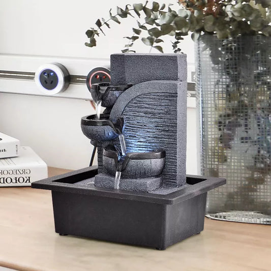 Fontaine à eau zen en résine grise, vue de face, débit réglable 220V