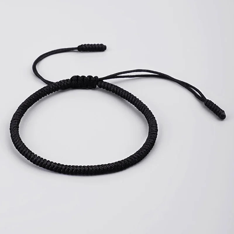 Bracelet tibétain noir coton tressé, noeud coulissant ajustable