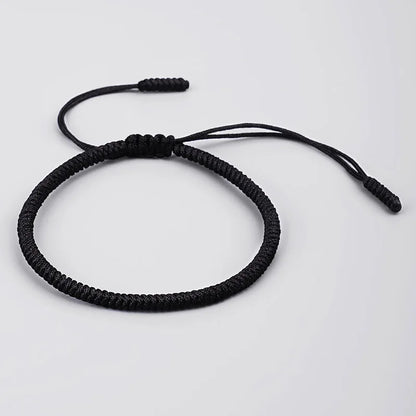 Bracelet tibétain noir, détail du tressage coton haute densité