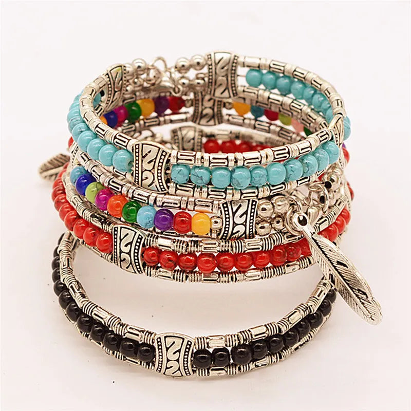 Bracelet tibétain vintage femme motif plume métal et corde tressée