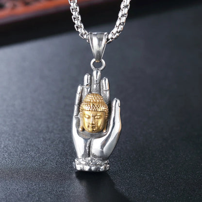 Pendentif Main de Bouddha en acier inoxydable, vue de face sur fond neutre