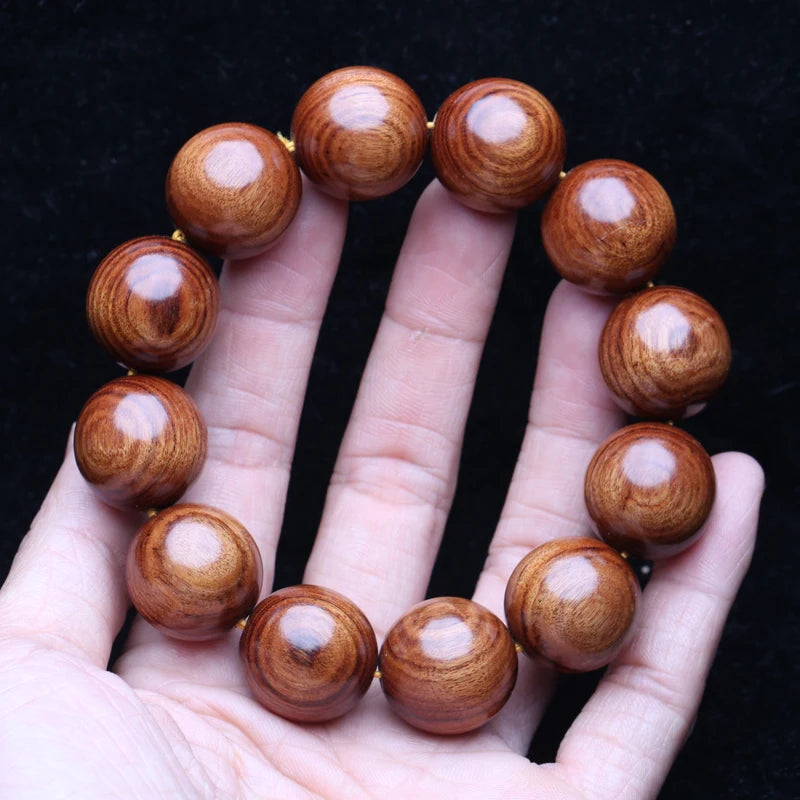Bracelet bouddhiste bois naturel homme cordon élastique vue de face