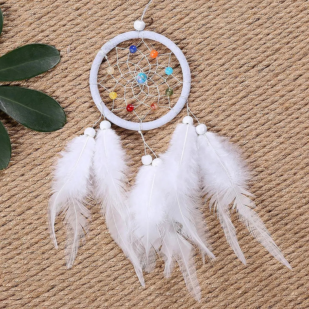 Attrape-rêve blanc plume naturelle 75 mm vue de face, tradition amérindienne