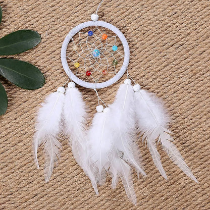 Attrape-rêve blanc plume naturelle 75 mm vue de face, tradition amérindienne