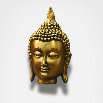 Statue de tête de Bouddha dorée