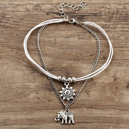 Bracelet de cheville éléphant porté à la cheville, finition dorée alliage de zinc