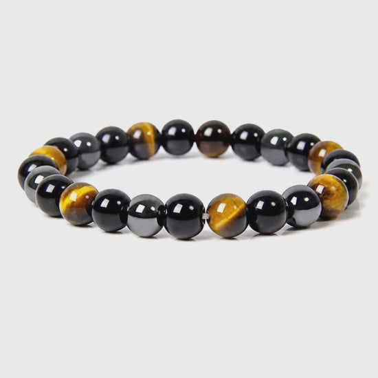 Bracelet de protection perles oeil de tigre, obsidienne, hématite : rotation 360