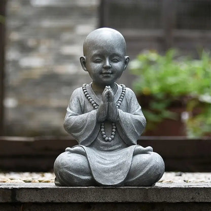 Statue petit moine en méditation